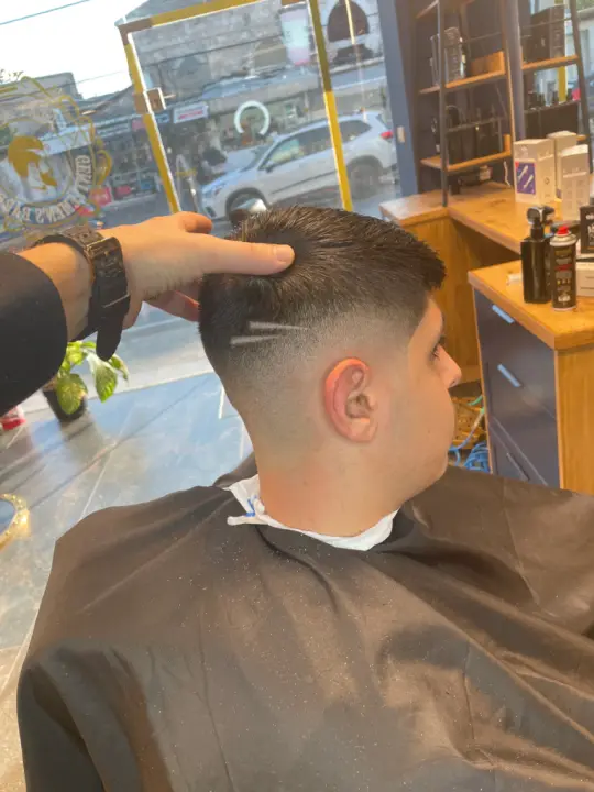 Men's haircut by Next Level Barbershop