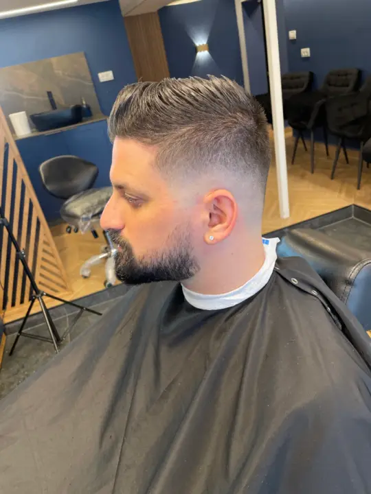 Men's haircut by Next Level Barbershop