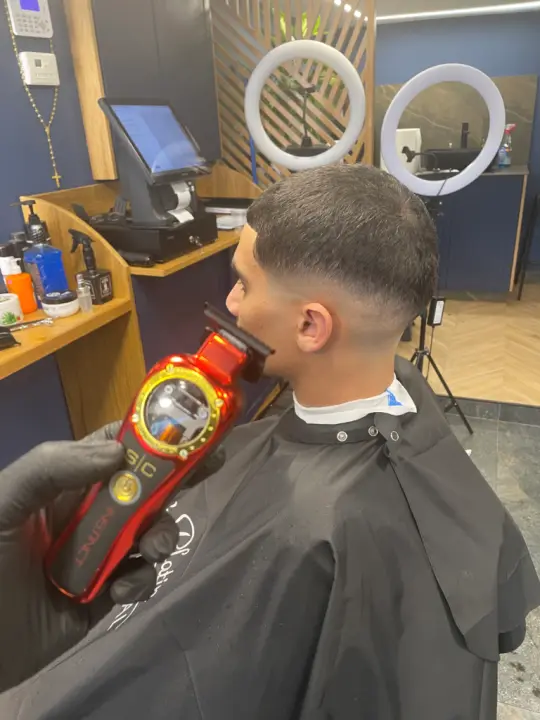 Men's haircut by Next Level Barbershop