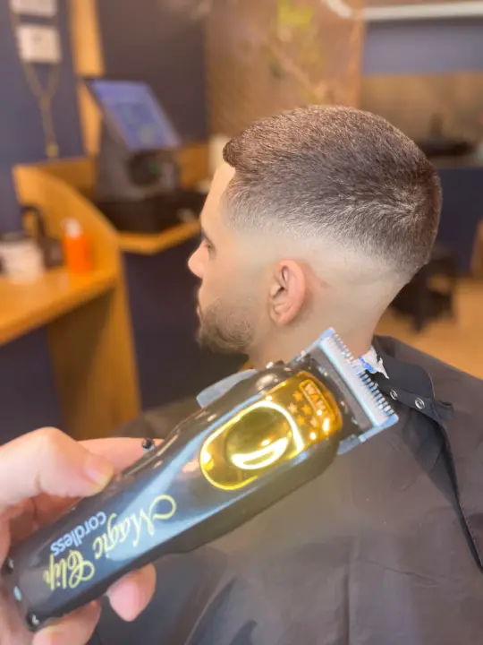 Men's haircut by Next Level Barbershop