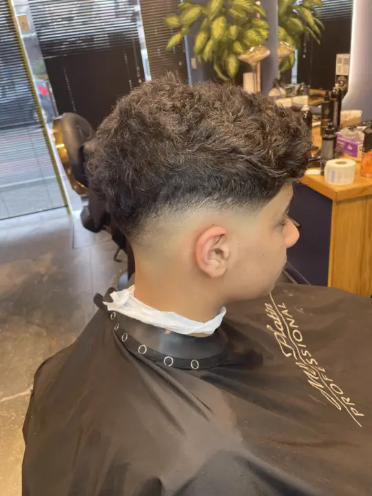 Men's haircut by Next Level Barbershop
